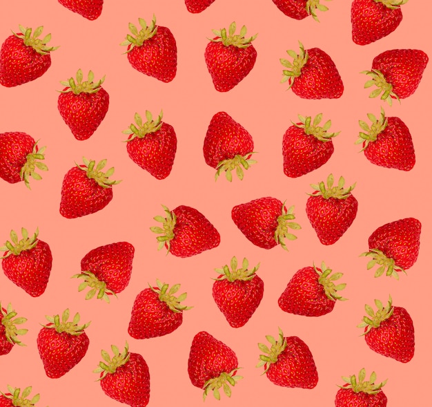 Premium Photo | Strawberries pattern on red background