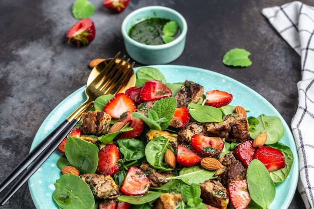 Premium Photo Strawberry Salad With Baby Spinach Chicken Liver Almond And Mint