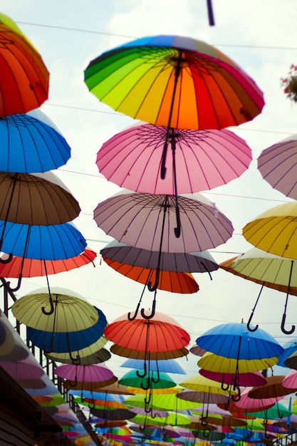 Premium Photo | Street decoration with bright umbrellas against the sky