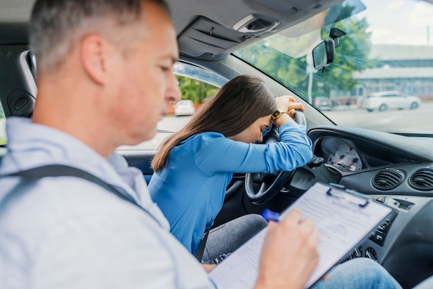 premium-photo-stressed-and-disappointed-young-woman-failed-on-driving