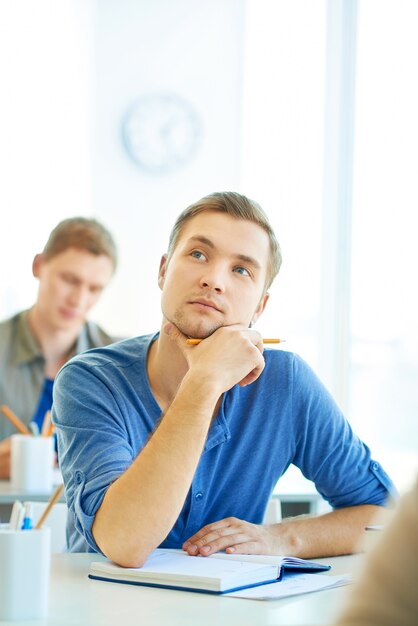 Student doing his exam Photo | Free Download