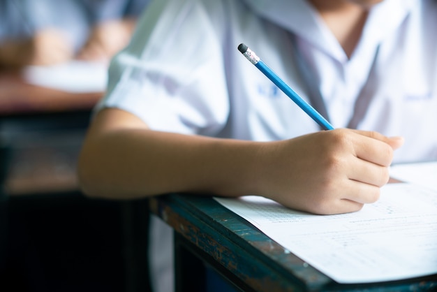 Premium Photo | Student doing test in classroom