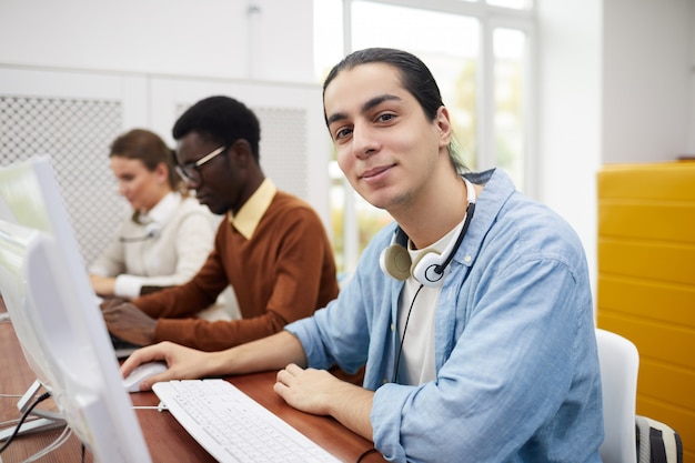 Premium Photo | Student using computer in college