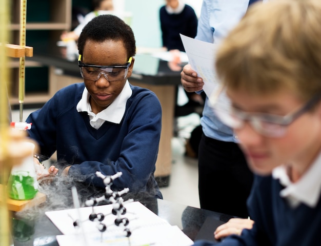 Premium Photo | Students boys learning biology science