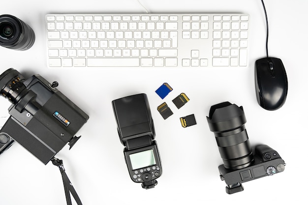 Studio photography with computers, cameras, flashes and multiple lens Premium Photo