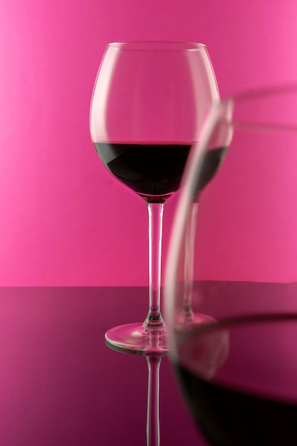 Premium Photo Studio Shot Of A Glass Of Red Wine Isolated On Pink Background Closeup Clean And Minimal Red Wine In A Big Glass Wine Concept