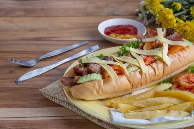 Stuffed bread in a black dish placed on a wooden table. Free Photo