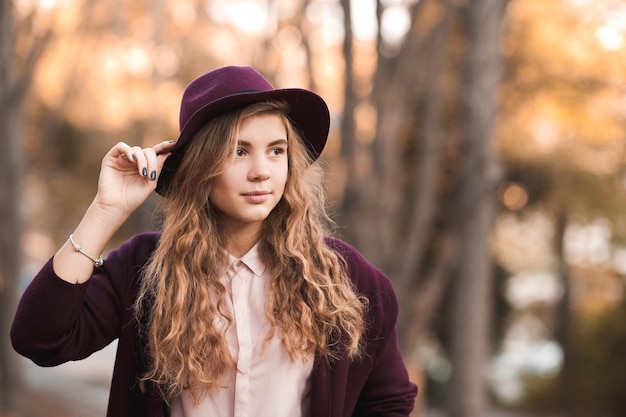 premium-photo-stylish-blonde-teen-girl-wearing-purple-hat-and-jacket