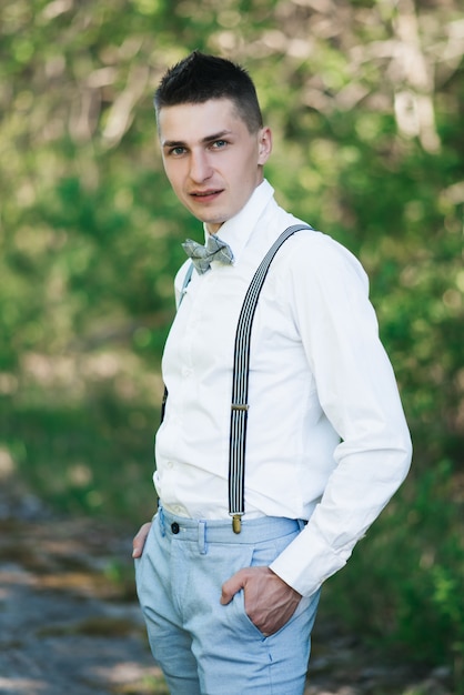 blue pant white shirt with tie