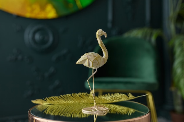 Premium Photo Stylish Statuette Of Flamingo And Decor On A Mirrored Coffee Table In An Art Nouveau Interior Colors Gold And Dark Green Modern Green Living Room Home Decor