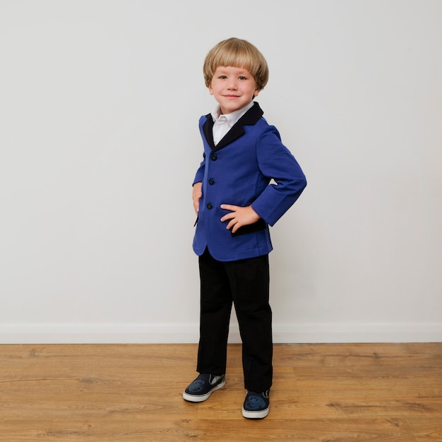 Premium Photo | Stylish trendy little boy in a suit.