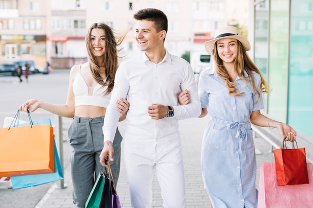 Free Photo | Stylish Women With Man Shopping Together