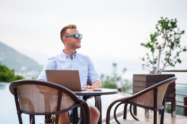 Premium Photo | Successful handsome male businessman in sunglasses ...