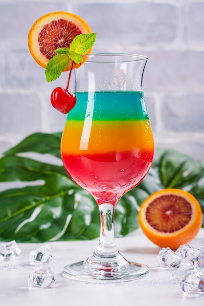 Premium Photo | Summer rainbow layered cocktail