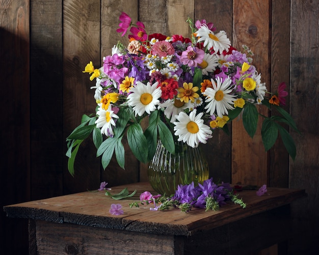 Premium Photo | Summer still life with a bouquet of garden flowers in ...