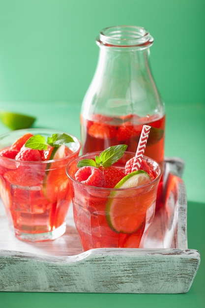 Summer strawberry raspberry lemonade with lime and mint