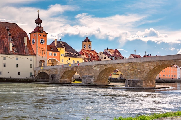 Premium Photo Sunny Stone Bridge And Regensburg Bridge Tower