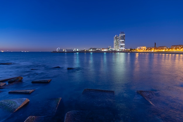 Sunrise on the city beach blue hour Premium Photo