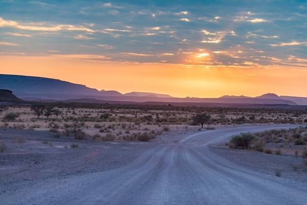 Premium Photo | Sunrise over the namib desert, roadtrip in the ...