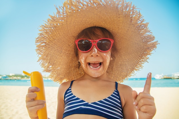 Premium Photo | Sunscreen on the skin of a child