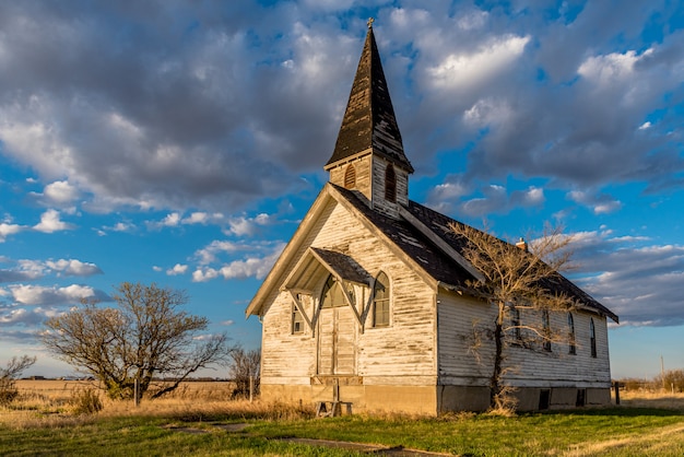 Premium Photo | Sunset light on the abandoned wartime united church in ...