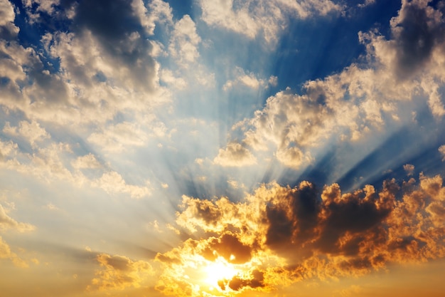 Premium Photo | Sunset sky clouds with sun rays