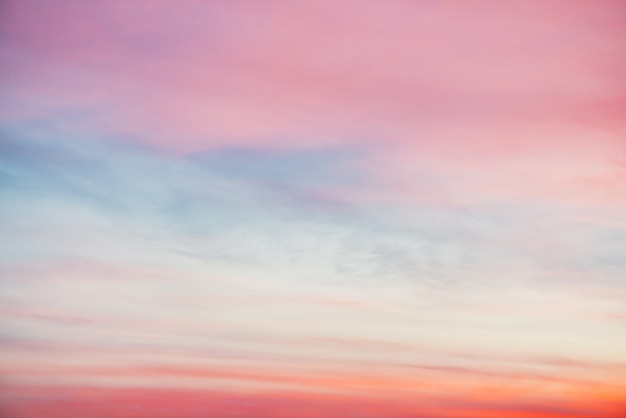 Sunset sky with pink orange light clouds. colorful smooth blue sky ...