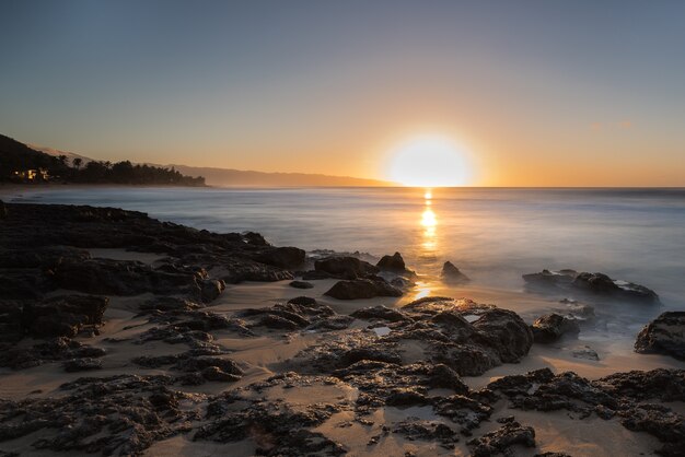 Premium Photo Sunset At Sunset Beach On The North Shore Of Oahu Hawaii With Surf Rolling In