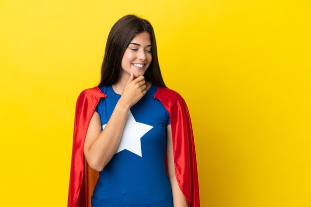 Premium Photo | Super hero brazilian woman isolated on yellow ...