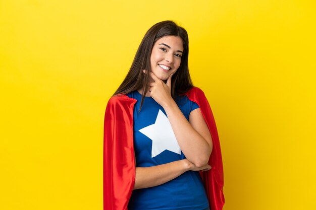 Premium Photo | Super hero brazilian woman isolated on yellow ...