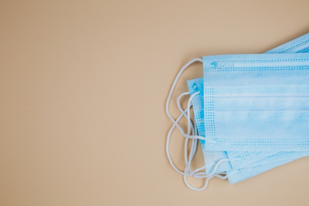 Premium Photo | Surgical masks with rubber ear bands.