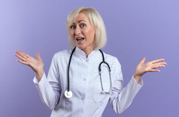 Free Photo | Surprised adult slavic female doctor in medical robe with ...