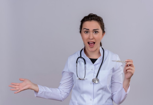 Free Photo | Surprised doctor young girl wearing medical gown wearing ...