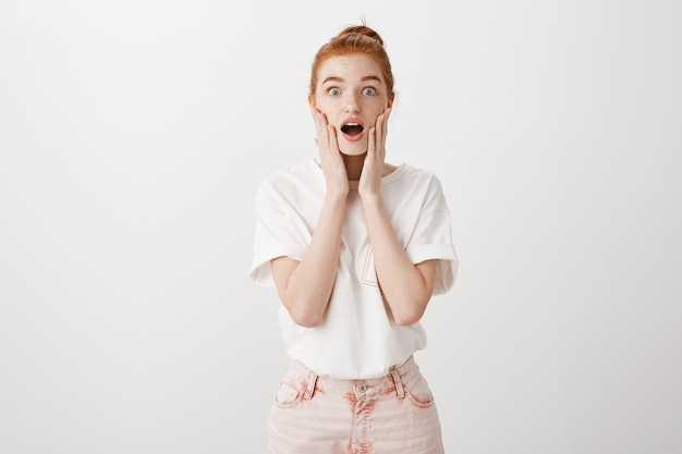 Free Photo Surprised Redhead Girl Stare Amazed Saying Wow 