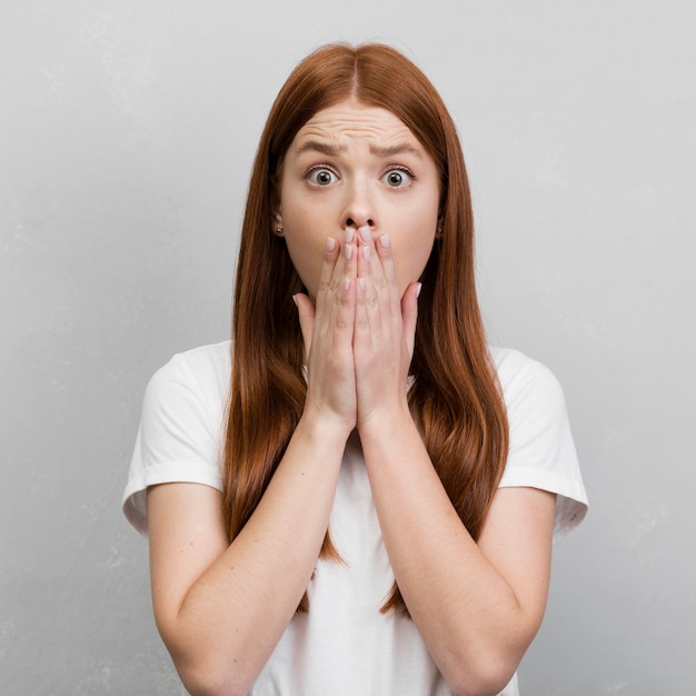 Premium Photo | Surprised woman in studio