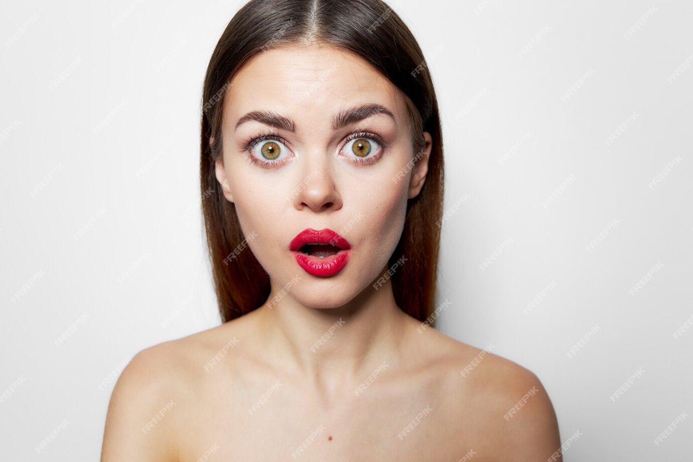 Premium Photo Surprised Woman With Red Lips Open Mouth Nude Shoulders