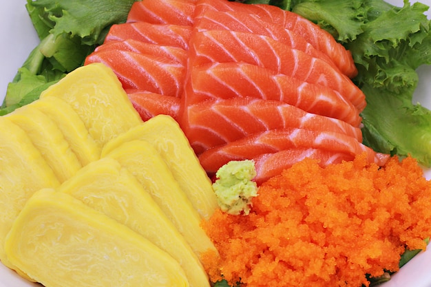 Premium Photo Sushi Set Raw Salmon Sashimi Tobiko Egg With Vegetables