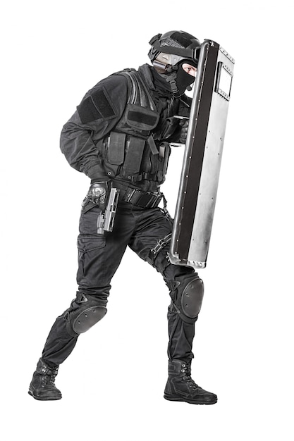Premium Photo | Swat officer with ballistic shield