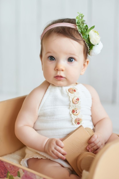 Premium Photo | Sweet funny baby in hat with flowers. eastercute baby ...