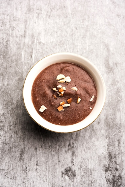 Premium Photo | Sweet Ragi Malt Or Healthy Ragi Porridge In A Bowl ...