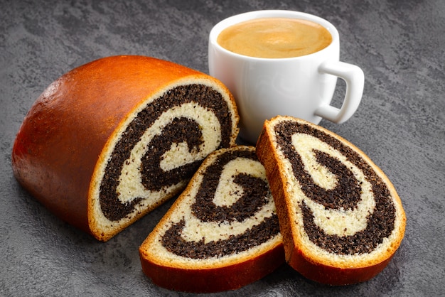 Premium Photo Sweet Roll Filled With Poppy Seed And Cup Of Coffee