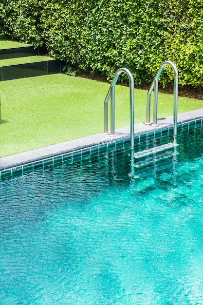 Free Photo  Swimming Pool Ladder With Grass Background-7998