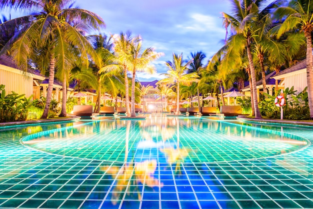 Swimming Pool With Palm Trees In Resort Hotel At Night Free Photo 6880