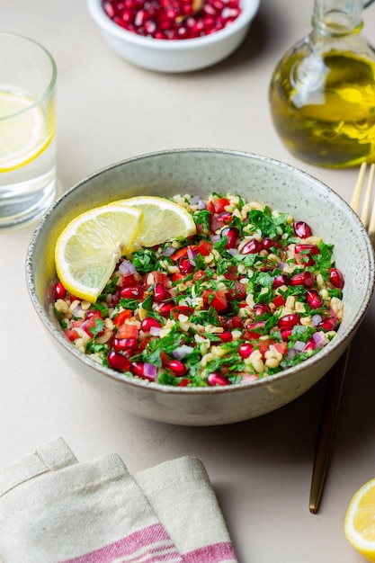 Premium Photo | Tabbouleh salad with bulgur, mint, parsley, tomatoes ...