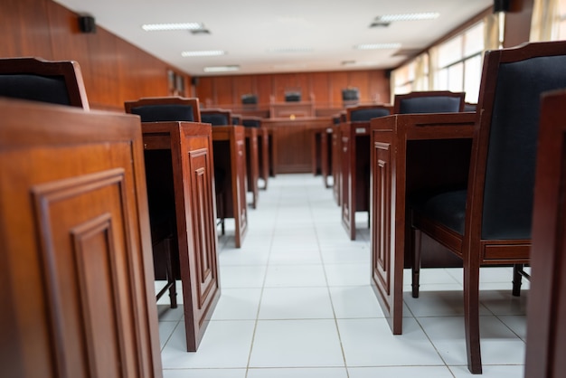 Premium Photo | Table and chair in the courtroom of the judiciary.