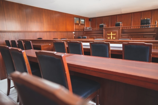 Premium Photo | Table and chair in the courtroom of the judiciary.