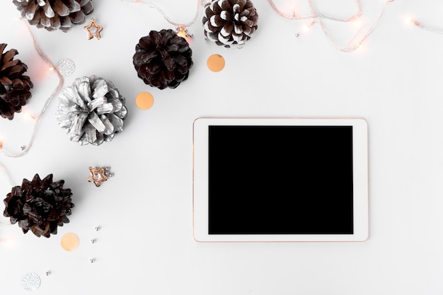 Premium Photo | Tablet display on table with isolated white screen for ...