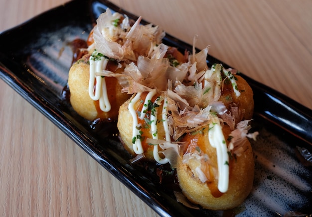 Premium Photo | Takoyaki, octopus balls, japanese food