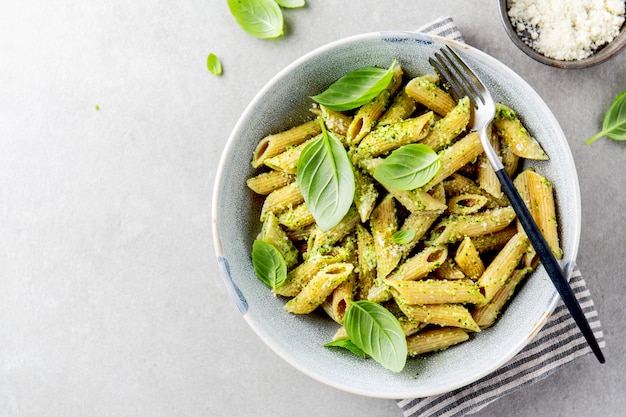 Tasty appetizing pasta with pesto sauce Premium Photo