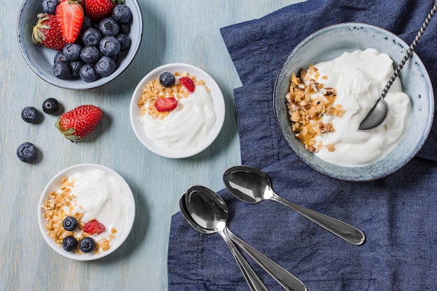 Tasty breakfast with yogurt and fruits Free Photo